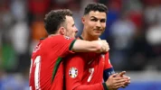Diogo Jota Bersama Cristiano Ronaldo Saat Selebrasi Kemenangan Timnas Portugal atas Slovenia Pada Babak 16 Besar UEFA Euro 2024